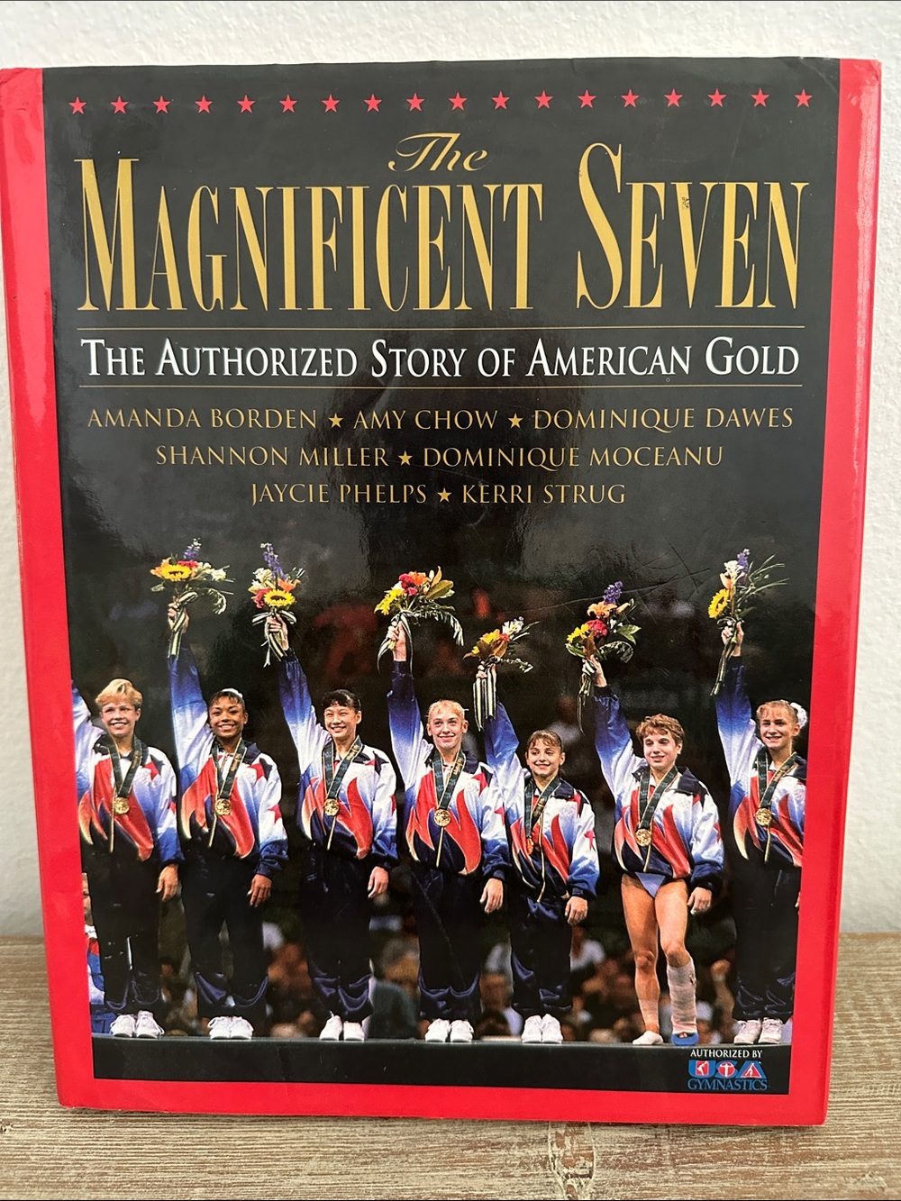 Autographed-The Magnificent Seven Hardcover Book - Red & Black Cover